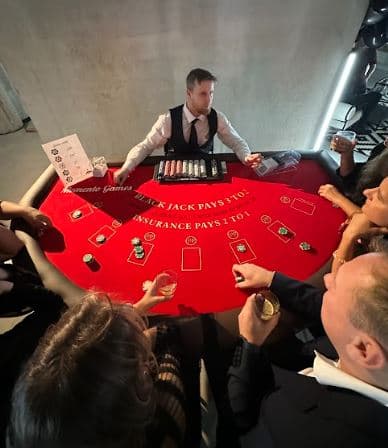 Blackjack dealer and table at the event Novirplaza